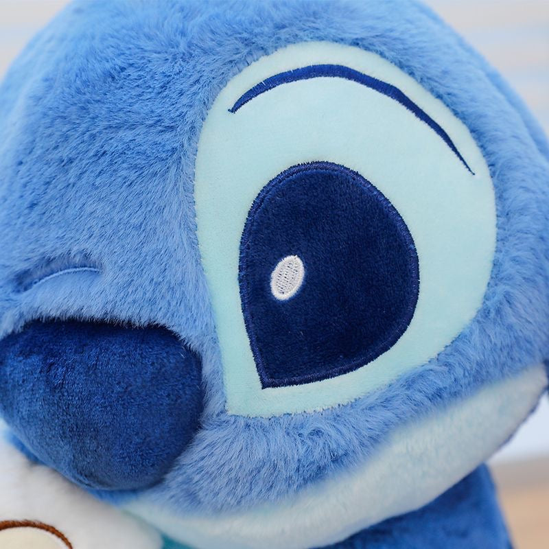 Peluche Stitch con pato