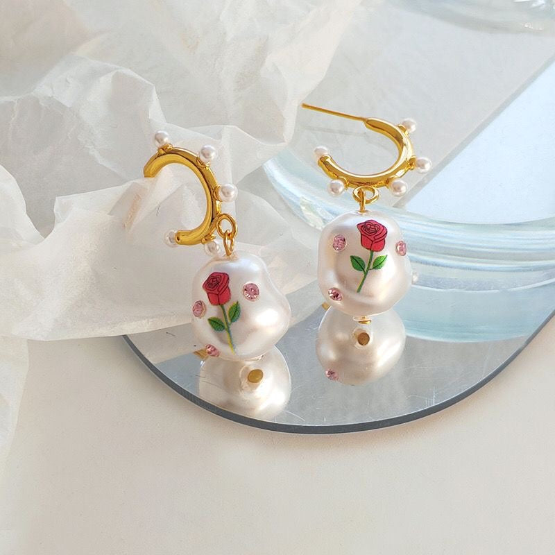 Aretes de piedra con rosa