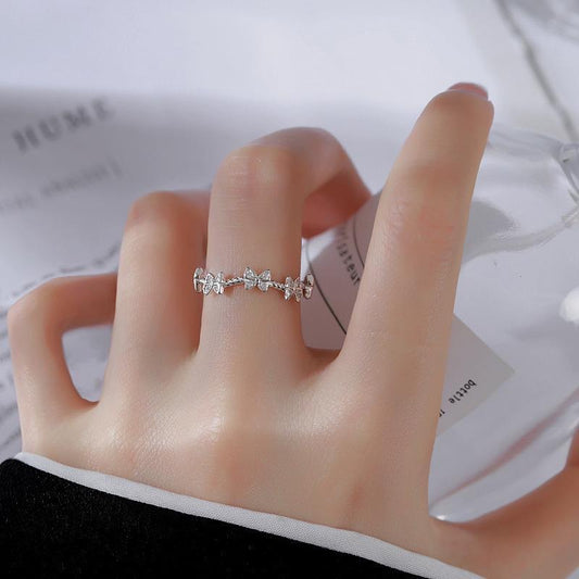 Anillo mariposas plateado ajustable