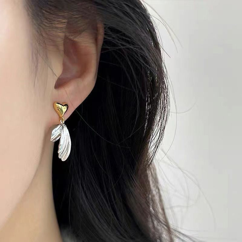 Aretes corazón con alas