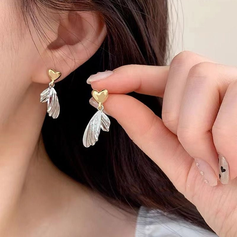 Aretes corazón con alas