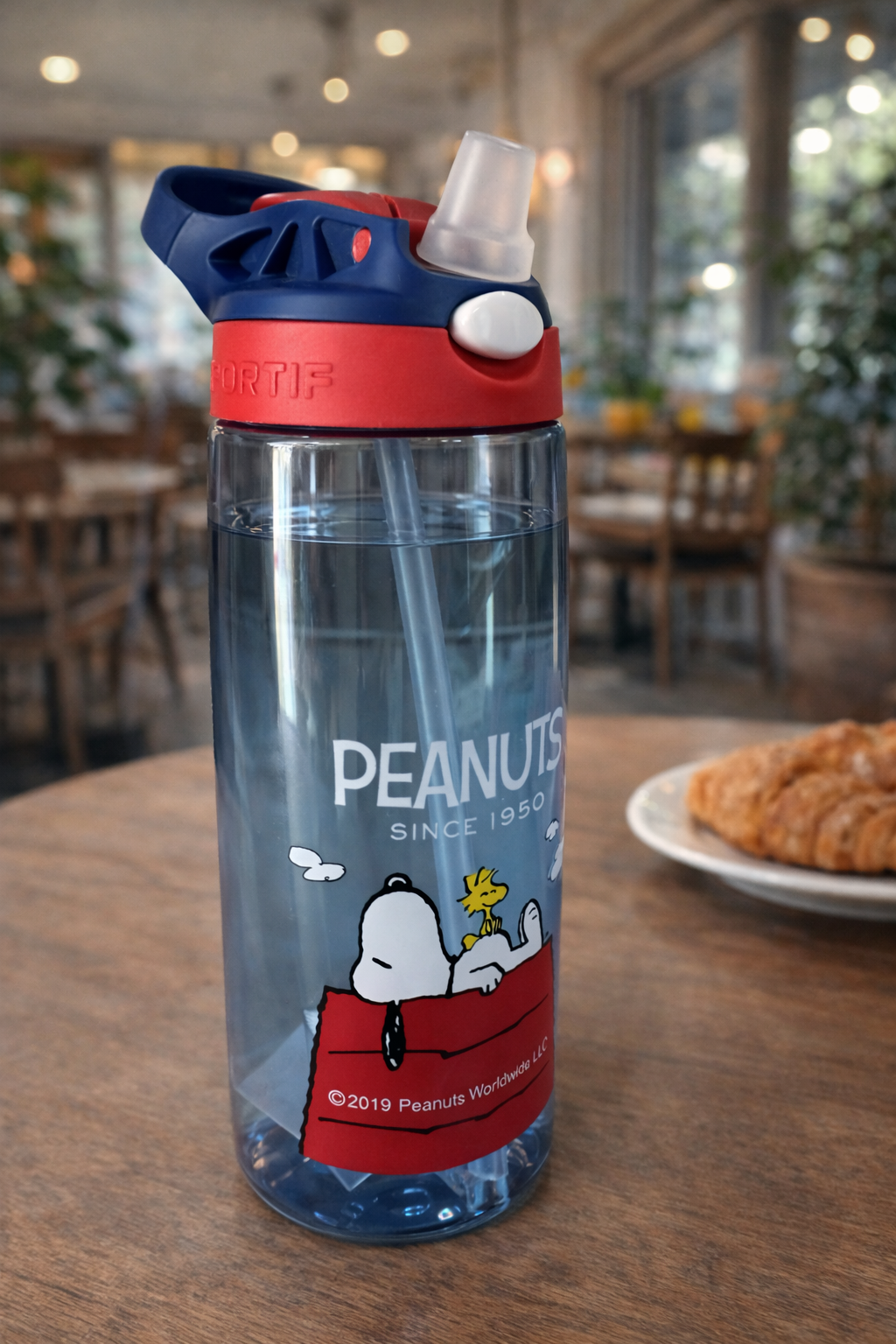 Botella azul Snoopy dormido