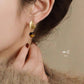 Aretes mariposa con piedra preciosa