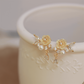 Arete flor elegante