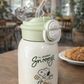 Botella verde snoopy